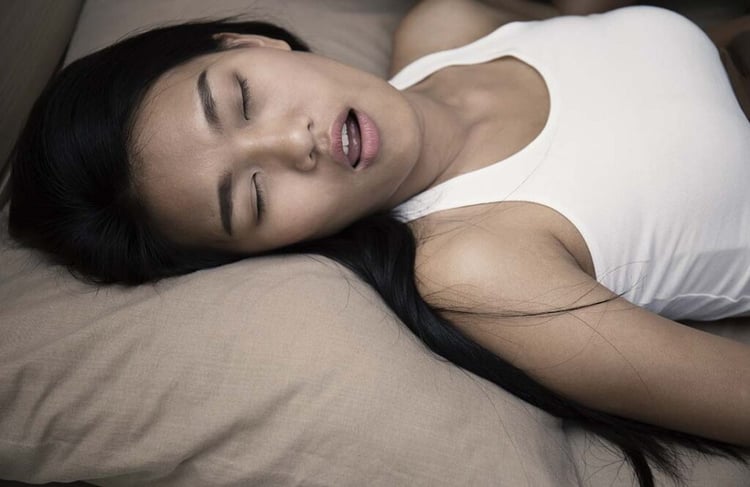 snoring-woman-1024x665-1